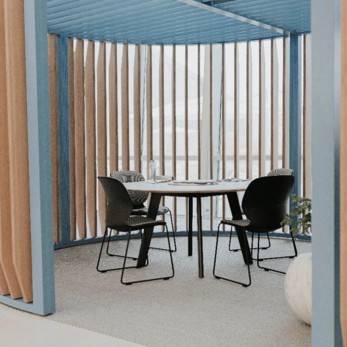 Immerse Round Table in lifestyle shot